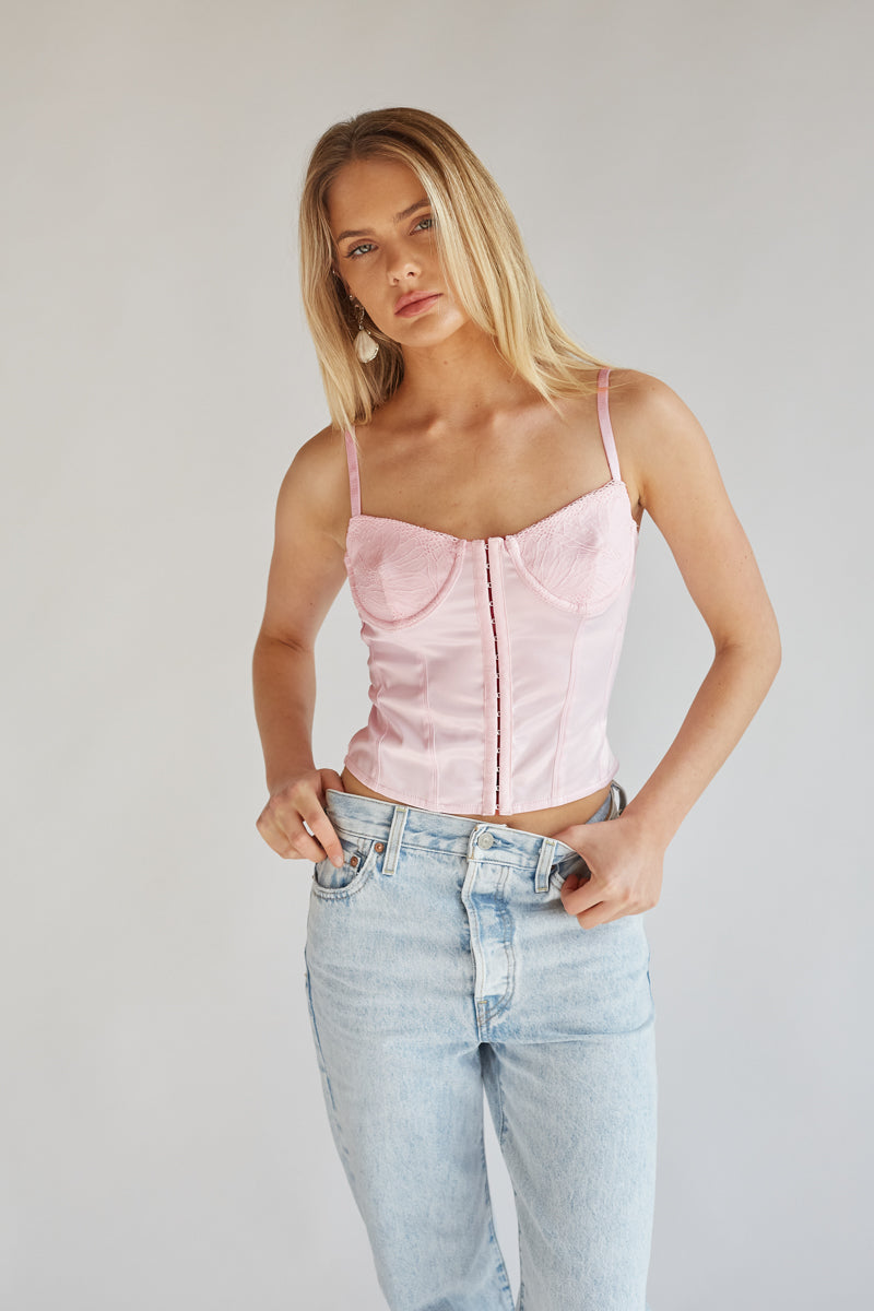 http://www.shopamericanthreads.com/cdn/shop/files/gracey-baby-pink-corset-top-american-threads-trendy-women_s-fashion-03-2recolored.jpg?v=1707423410&width=1024