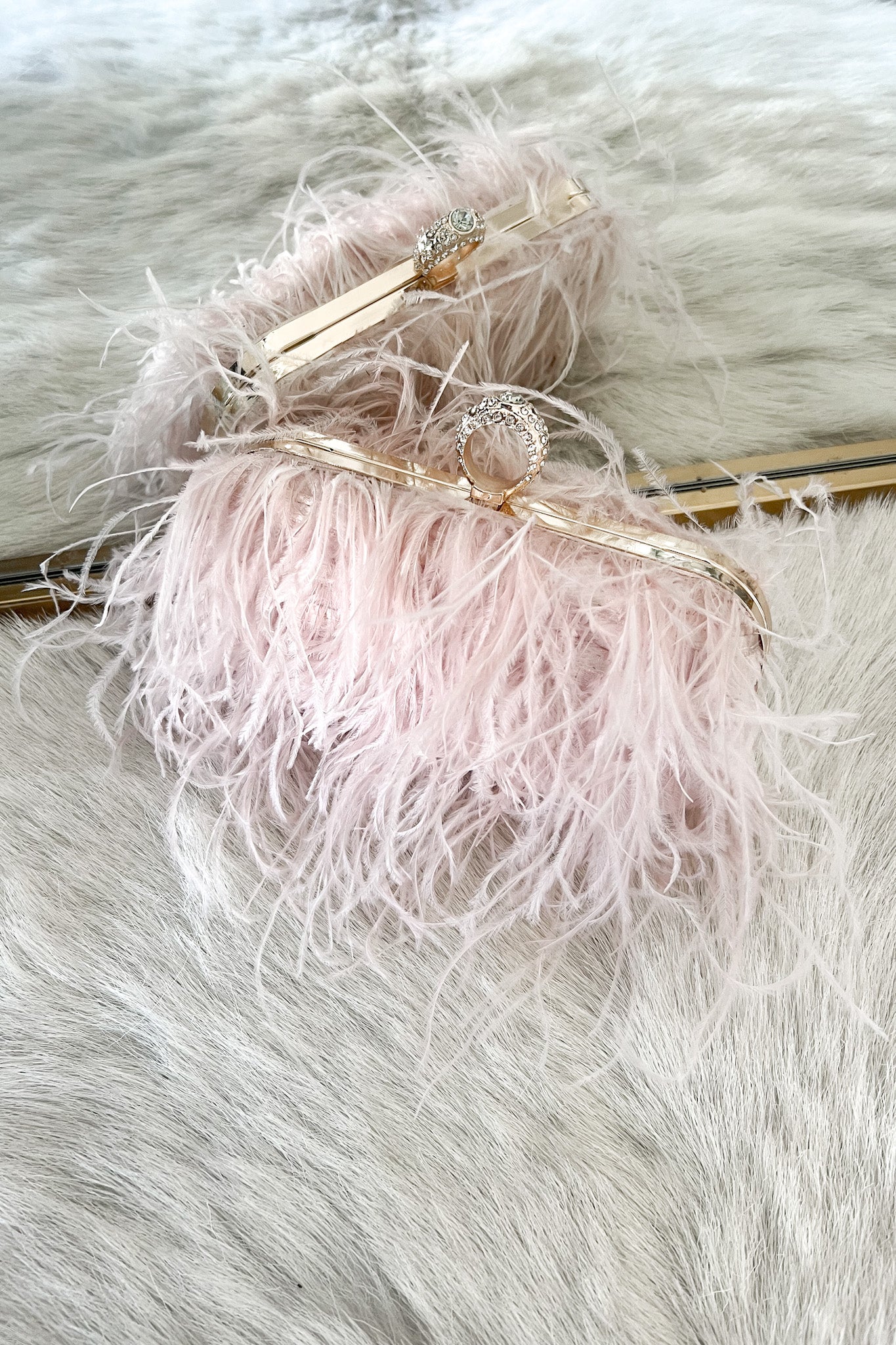 Pink feather clutch online bag