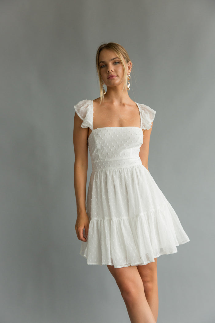 Front view | White Flutter sleeve open back mini dress| rush dress