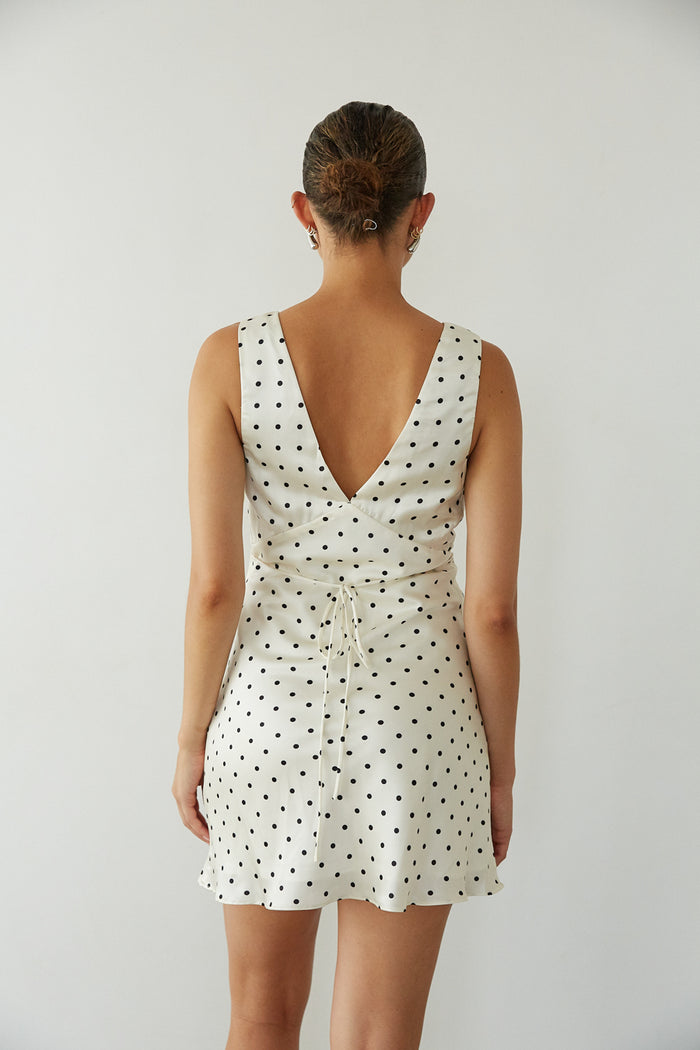 back view | v neck white and black polka dot mini dress