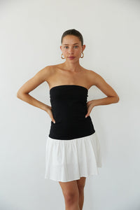 front view | black and white strapless fit and flare mini dress