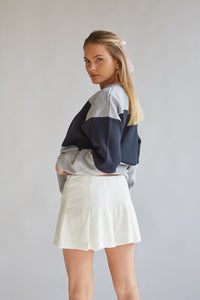 white pleated micro tennis skort