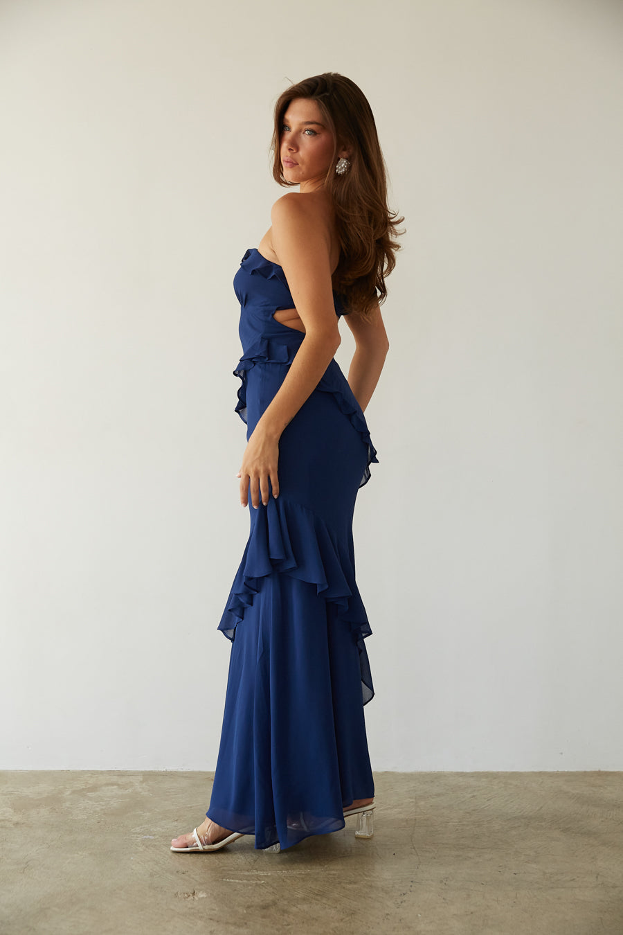 blue-image | side-view | navy blue strapless chiffon maxi dress with ruffles and frill detailing