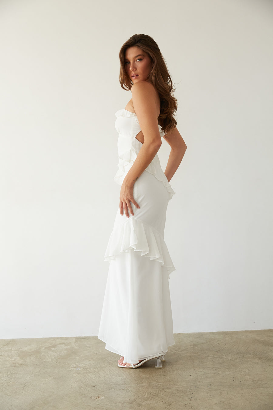 white-image | side-view | white strapless chiffon maxi dress with ruffles and frill detailing