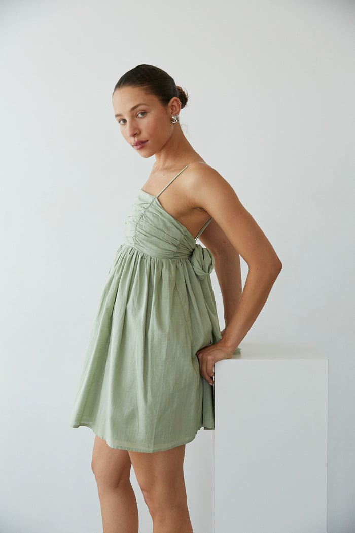 Sage Green-Image | Side View | Pleated bust spag strap open tie back babydoll mini dress | Rush Dress