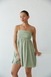 Sage Green-Image | Front View | Pleated bust spag strap open tie back babydoll mini dress | Rush Dress