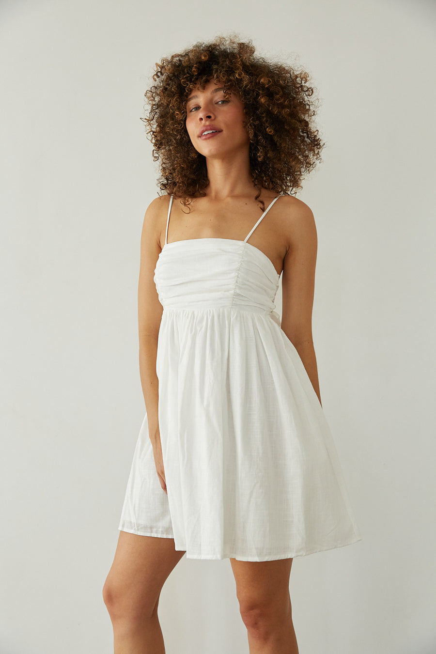 White-Image | Front View | Pleated bust spag strap open tie back babydoll mini dress | Rush Dress