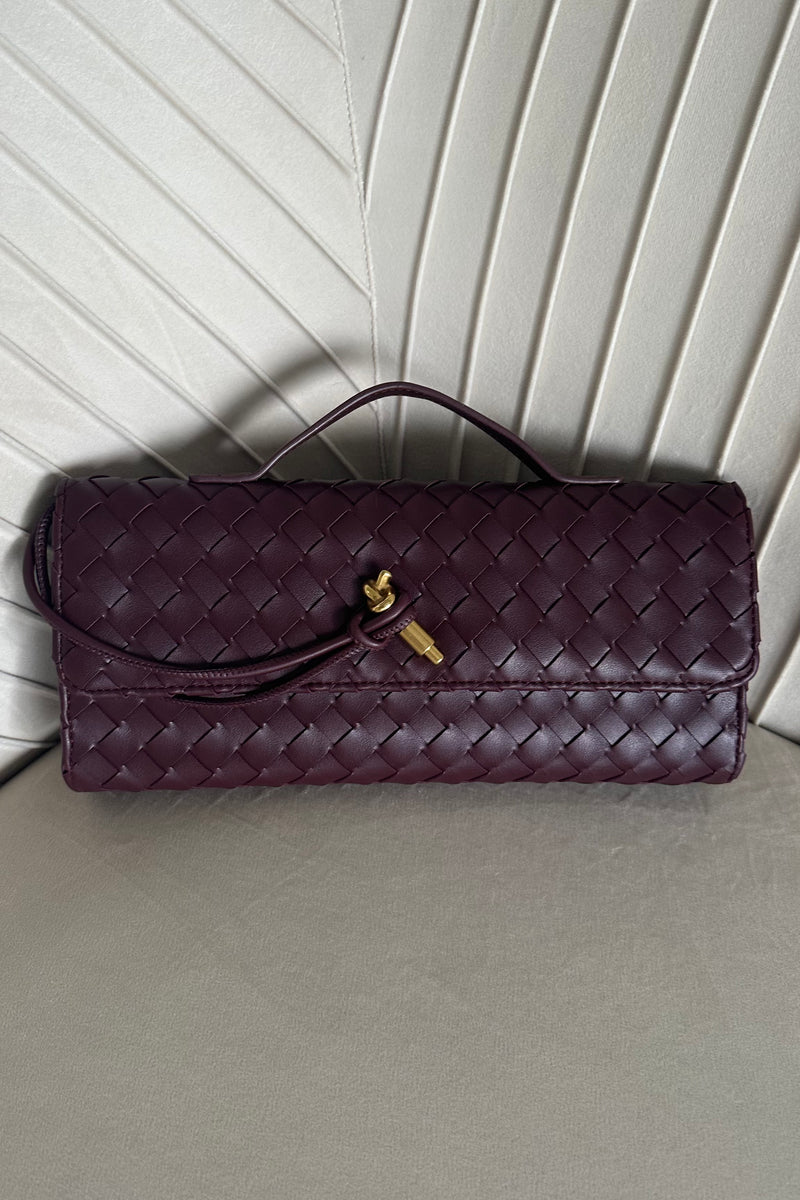 merlot woven clutch with shoulder strap | front view