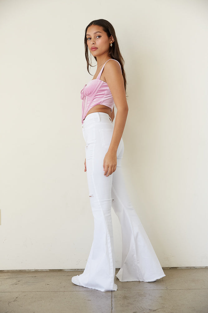 white distressed flare jeans